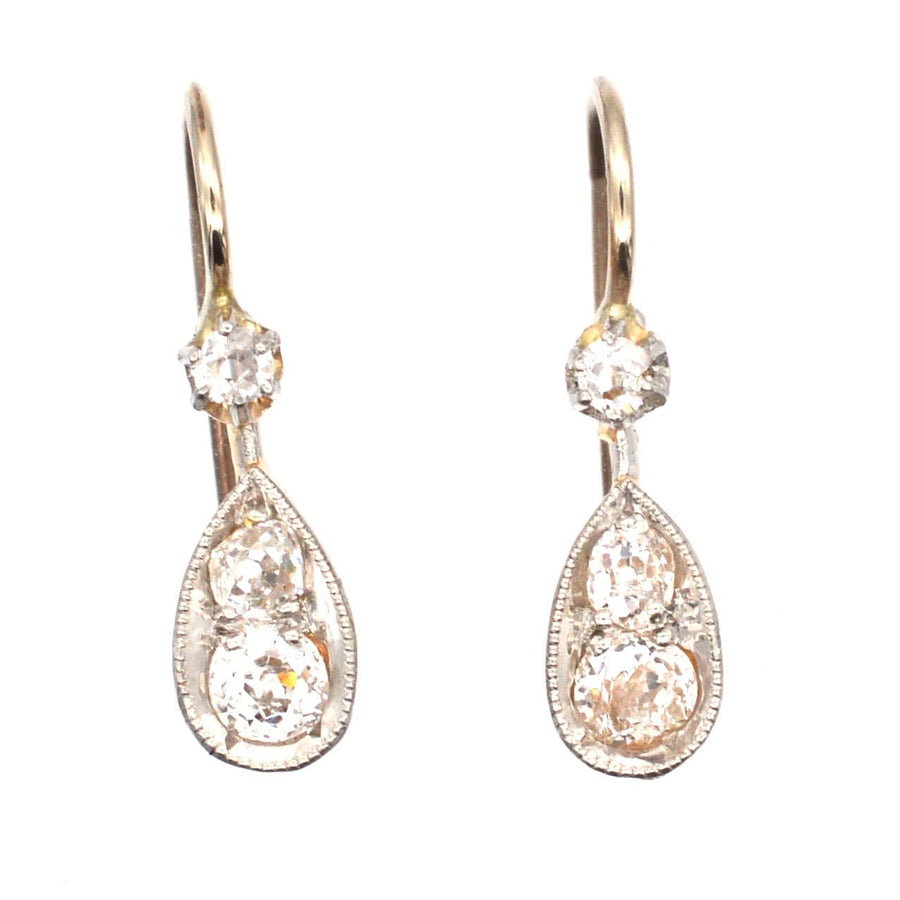 Elegant Edwardian 15ct gold and platinum diamond drop earrings with old cut diamonds, classic design from circa 1900.