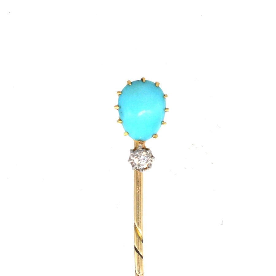 Edwardian 15ct gold tie pin featuring a pear-shaped cabochon turquoise and a single diamond accent.