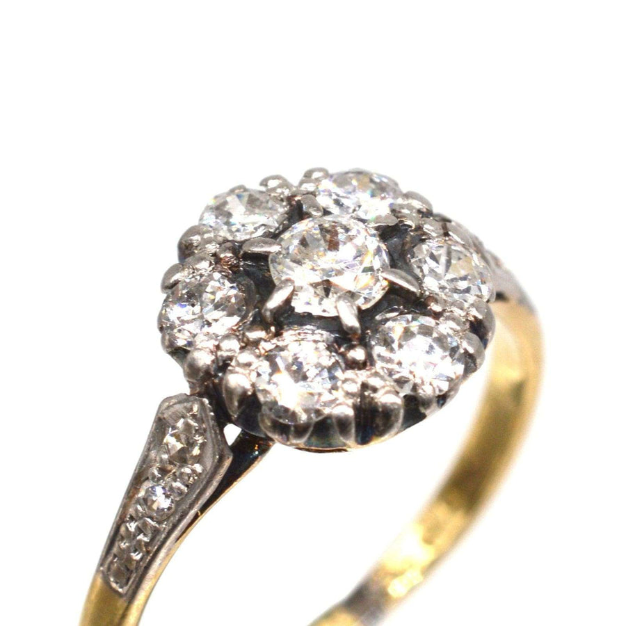 Edwardian 18ct gold and platinum diamond cluster ring with approx. 0.70 carats total diamond weight.