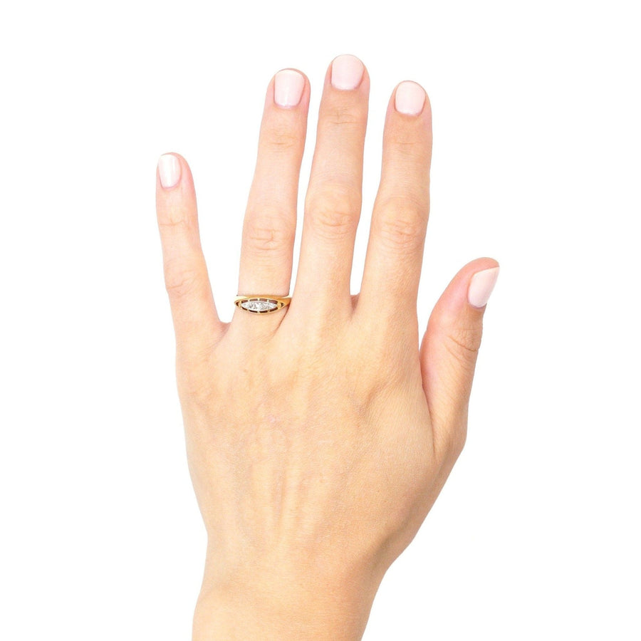 Edwardian 18ct gold and platinum five stone diamond boat-shaped ring worn on a hand, showcasing its elegance.