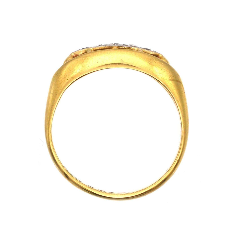 Edwardian 18ct gold and platinum diamond boat shaped ring, showing the band and setting from the side view.