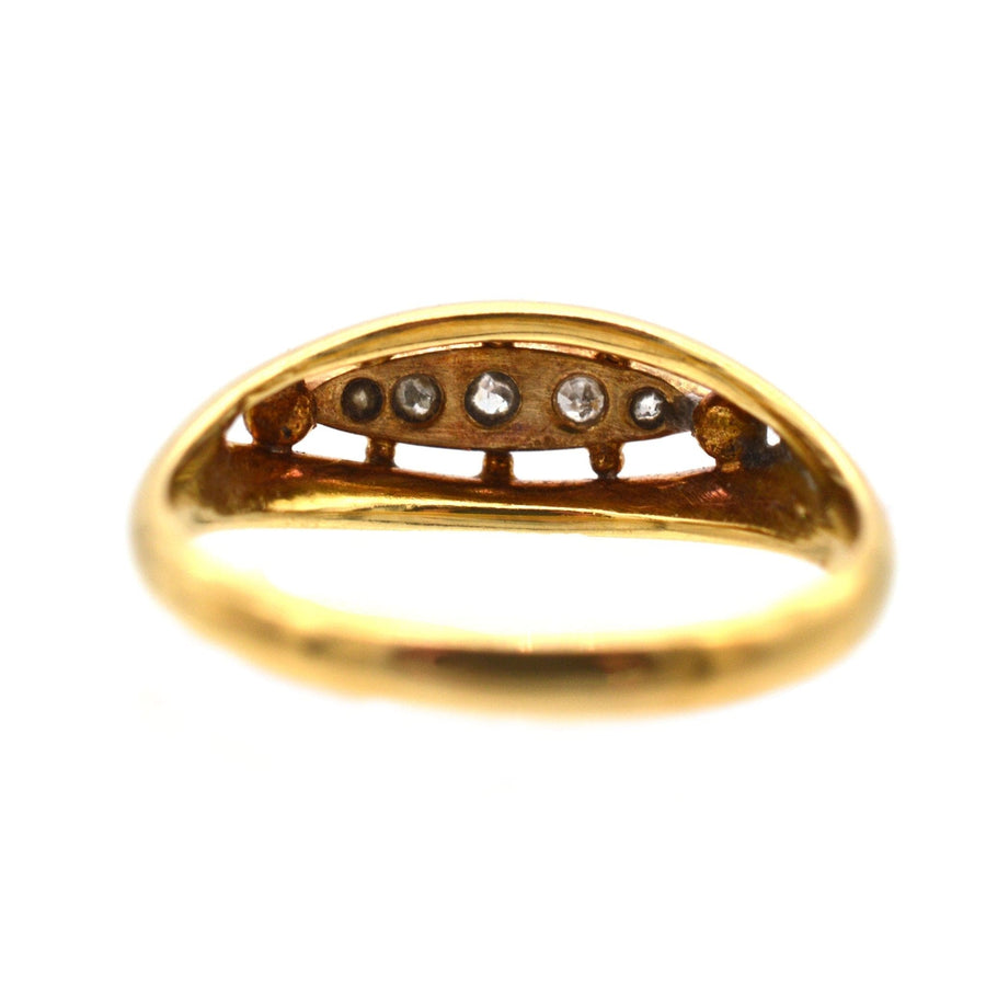 Edwardian 18ct gold and platinum five stone diamond boat-shaped ring from circa 1900, featuring old European cut diamonds.