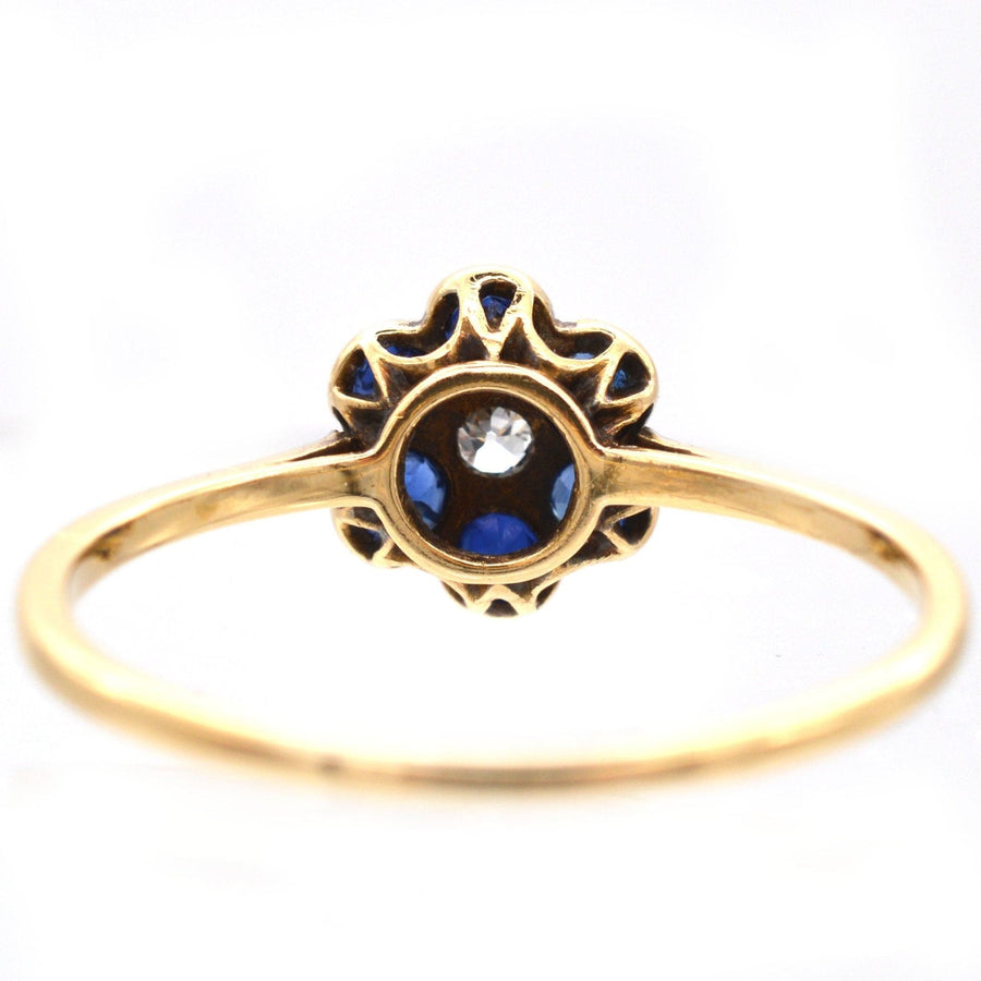 Edwardian 18ct gold and platinum sapphire diamond flower cluster ring, circa 1910, colorful engagement ring.