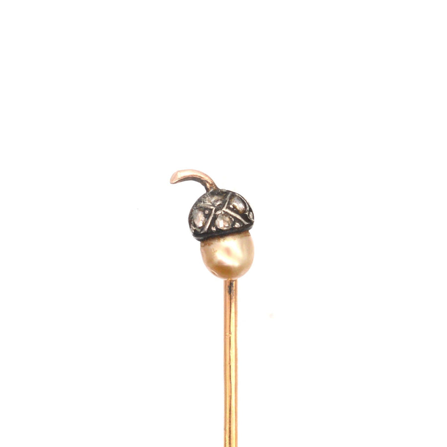 Edwardian 9ct gold and silver acorn tie pin featuring diamond and natural pearl, perfect for elegant silk ties.
