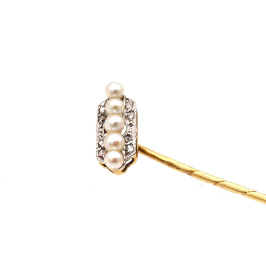 Edwardian tie pin featuring five pearls, crafted in platinum and 14ct gold, ideal for enhancing silk ties.