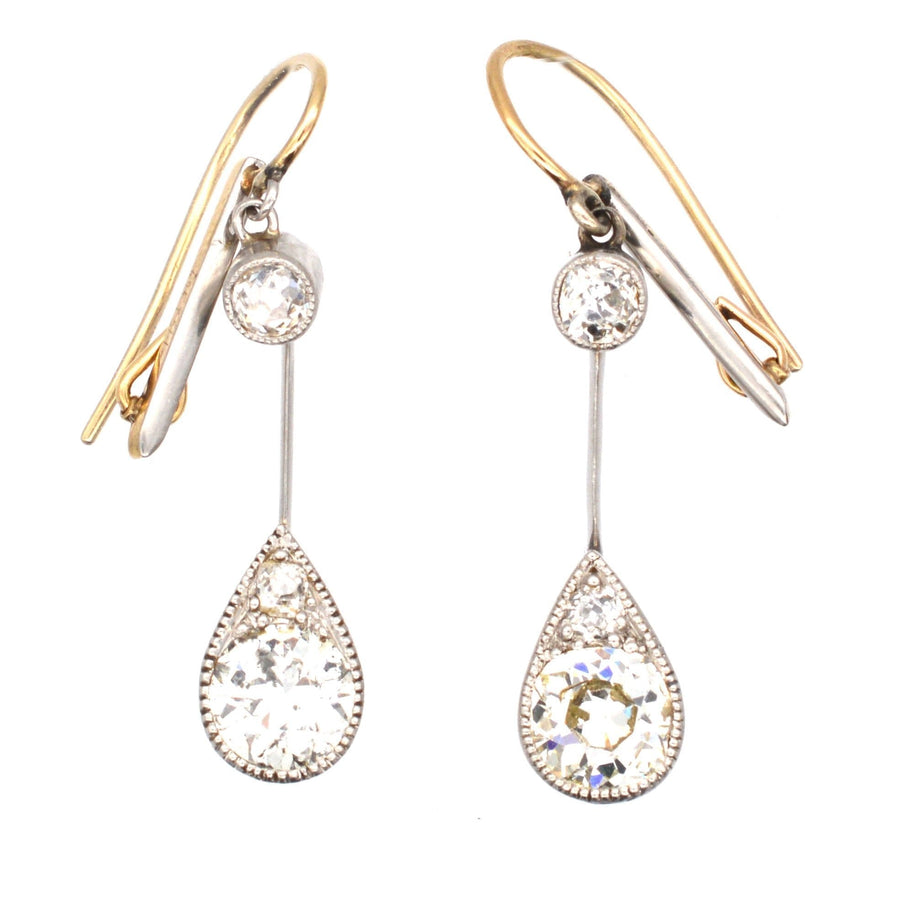 Edwardian platinum and gold diamond drop earrings with pear-shaped setting and old cut diamonds