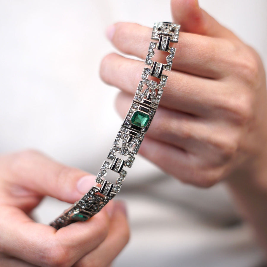 French Art Deco bracelet featuring emerald green and diamond paste in a unique geometric design.