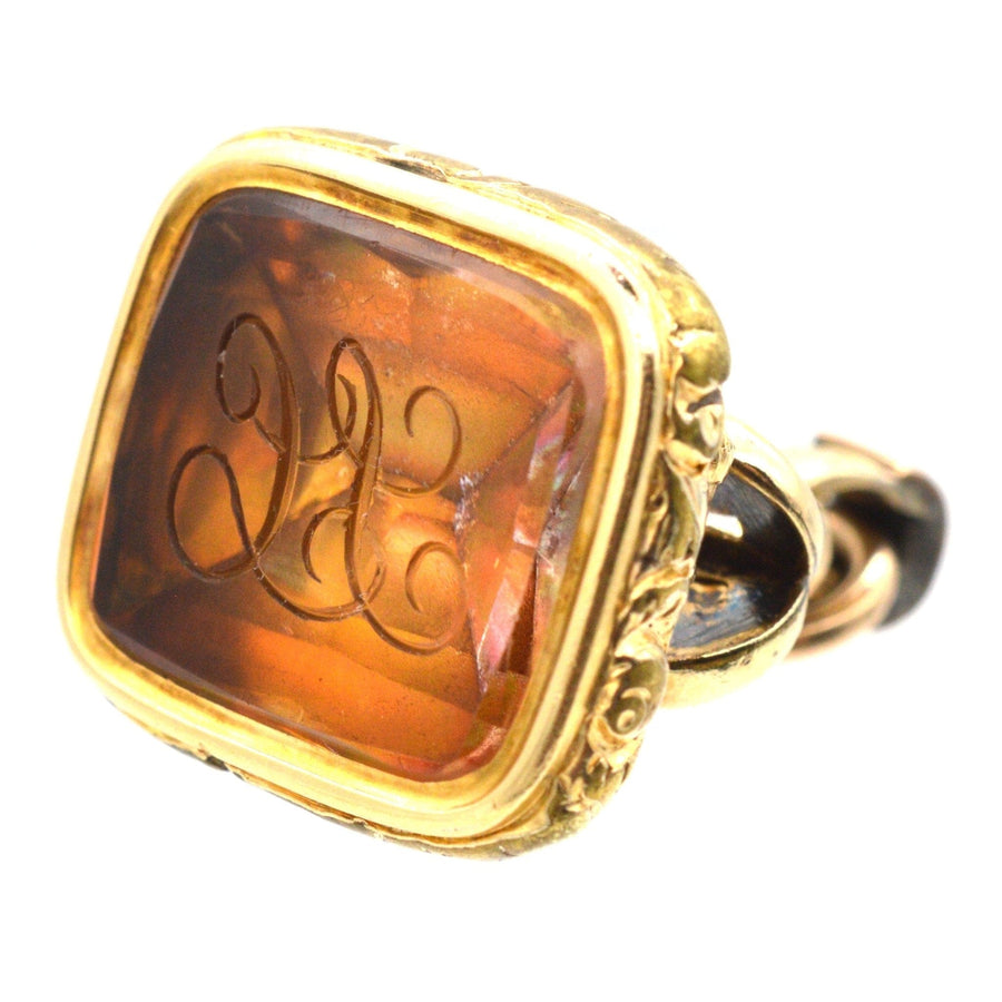 Georgian gold cased seal featuring citrine intaglio with monogram 'SC', showcasing intricate decorative details from c.1820.