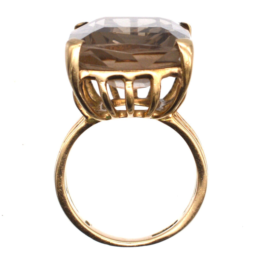 Large mid-century 9ct gold smoky quartz cocktail ring with openwork shank, perfect for any occasion.