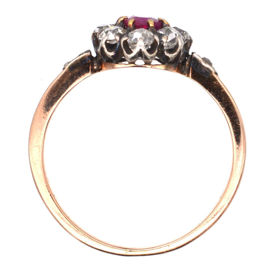 Late Victorian silver and rose gold cluster ring featuring a Burma ruby and old mine cut diamonds.