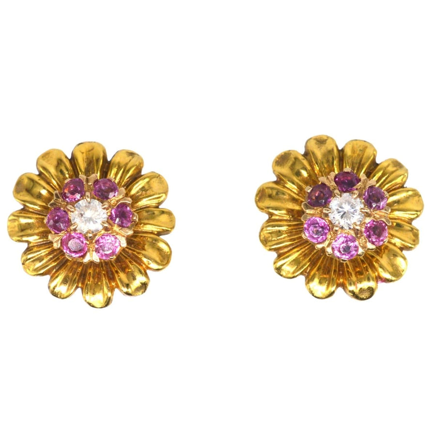 Mid-century gold flower petal earrings featuring ruby and diamond clusters, elegant and detachable design.