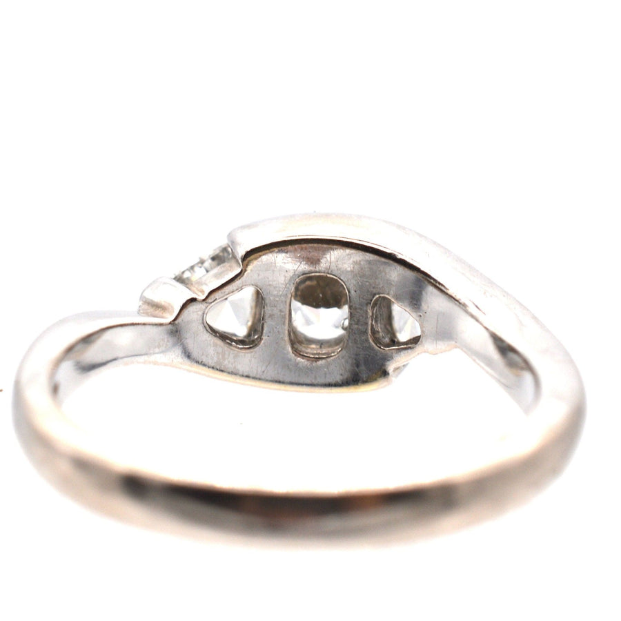 Modern 18ct white gold ring showcasing the unique design and GIA certified diamonds, including a cushion cut diamond.