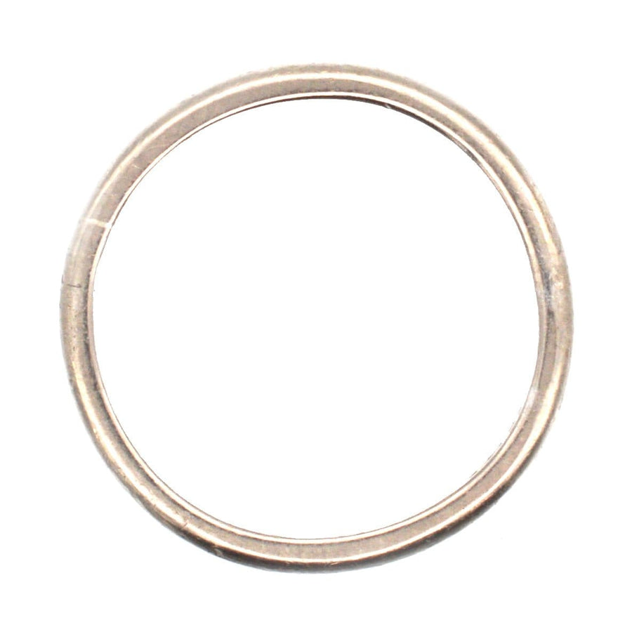 Modern 18ct white gold wedding ring with a simple plain band design, ideal for stacking or as a wedding band.