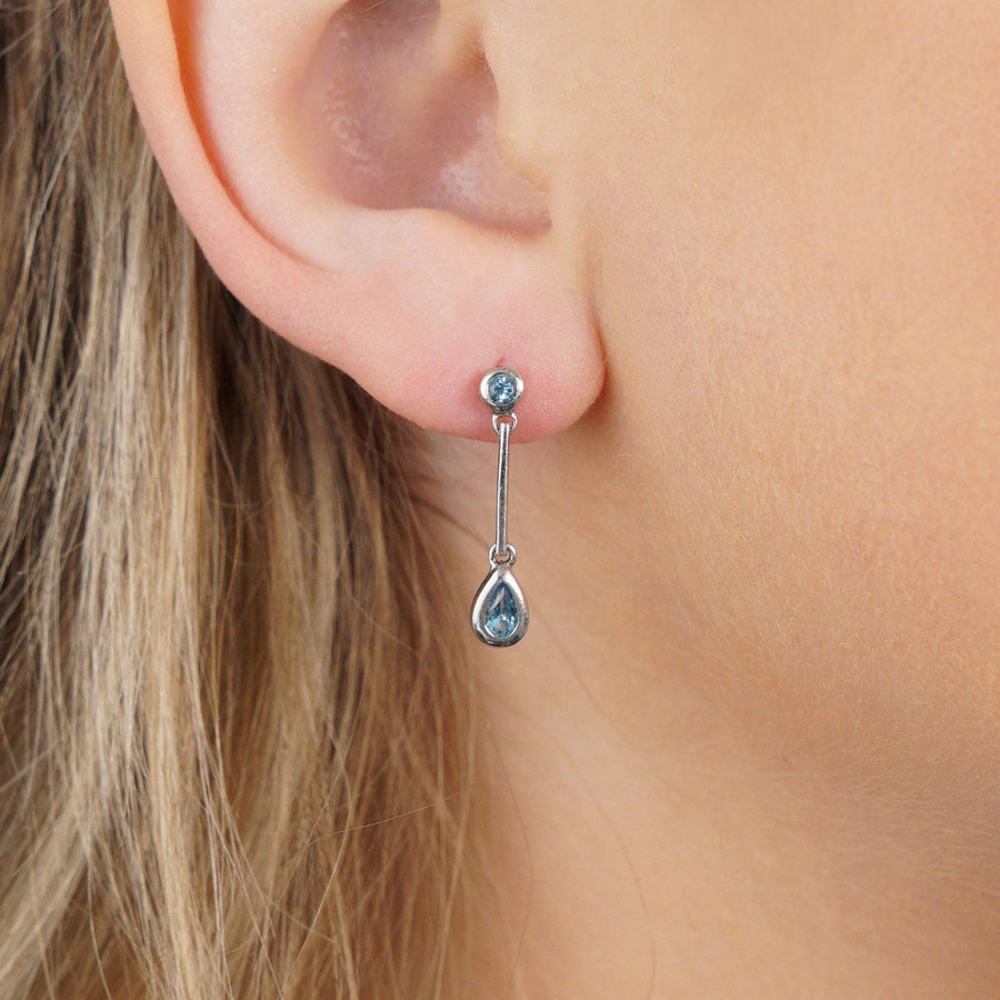 Modern 9ct white gold blue spinel pear drop earrings, perfect for day-to-night wear and comfortable style.