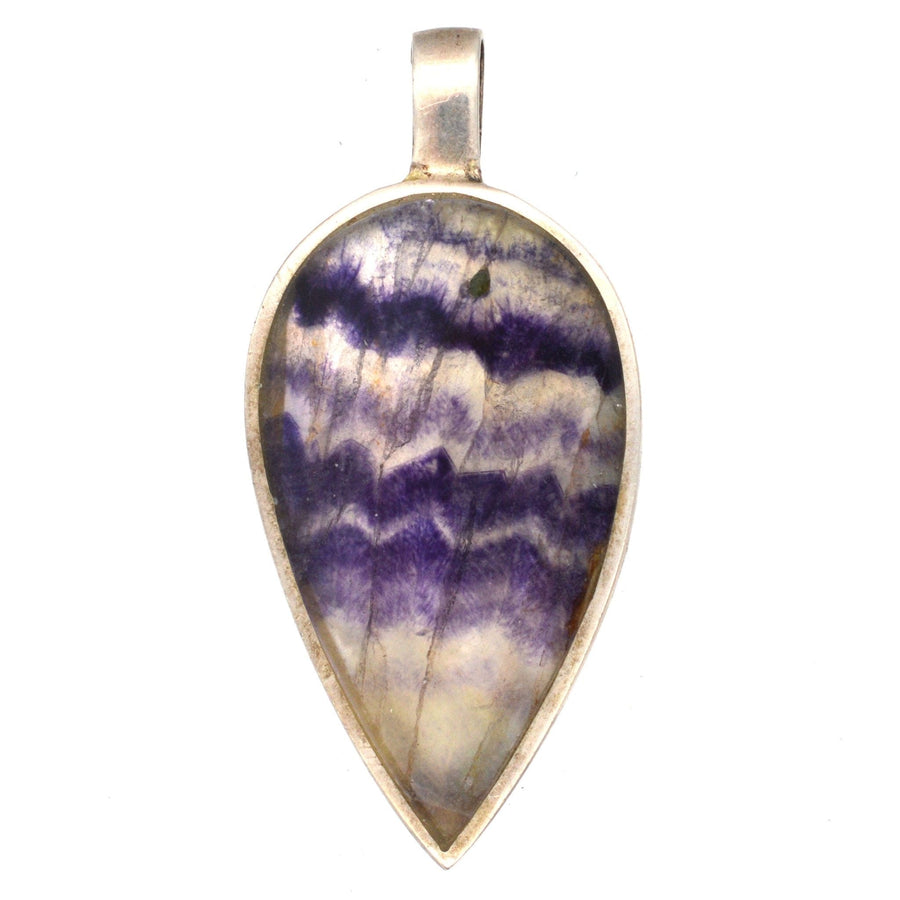 Large modern silver blue john and mother of pearl pendant in reverse pear shape, showcasing unique purple-blue bands.