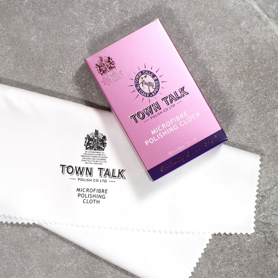 Town Talk Microfibre Polishing Cloth packaging with cloth, ideal for cleaning delicate surfaces and electronics.