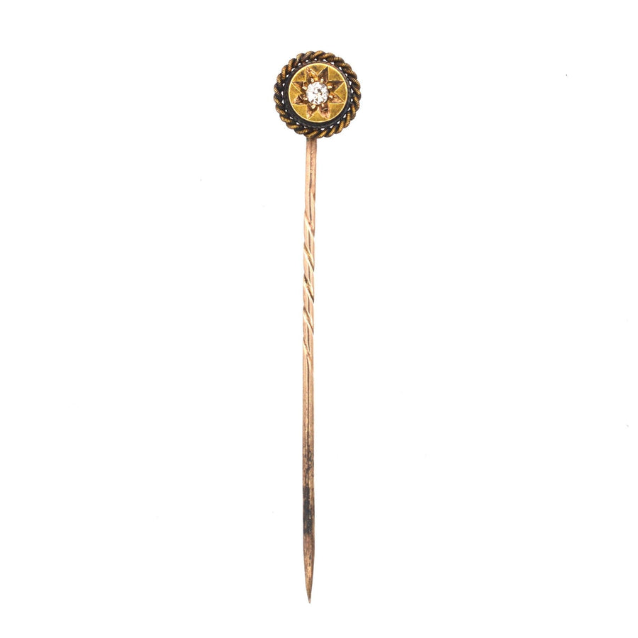 Victorian 15ct gold tie pin with star motif and old cut diamond, circa 1880s, featuring eternal rope detail.