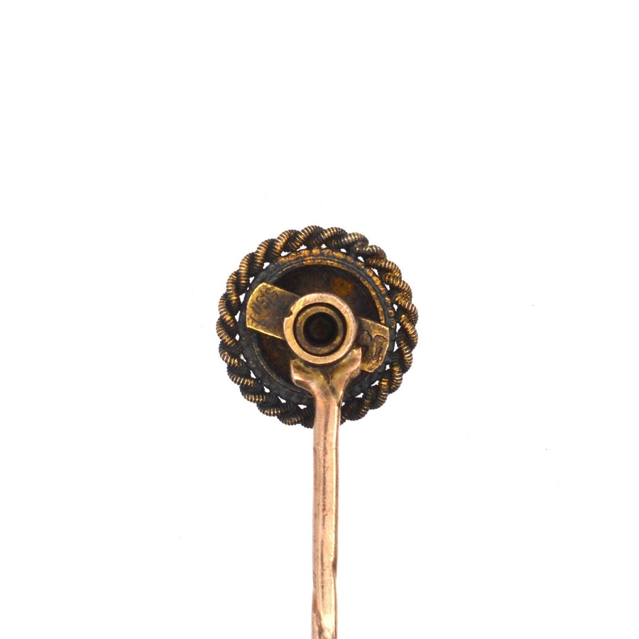 Victorian 15ct gold tie pin featuring star motif and old cut diamond with eternal rope detail.