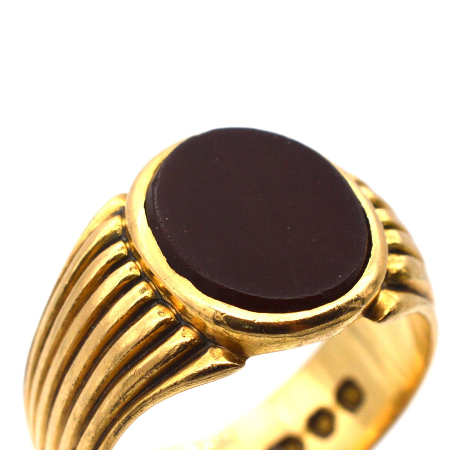 Victorian 18ct gold signet ring featuring a polished carnelian stone, handcrafted in London, 1888.