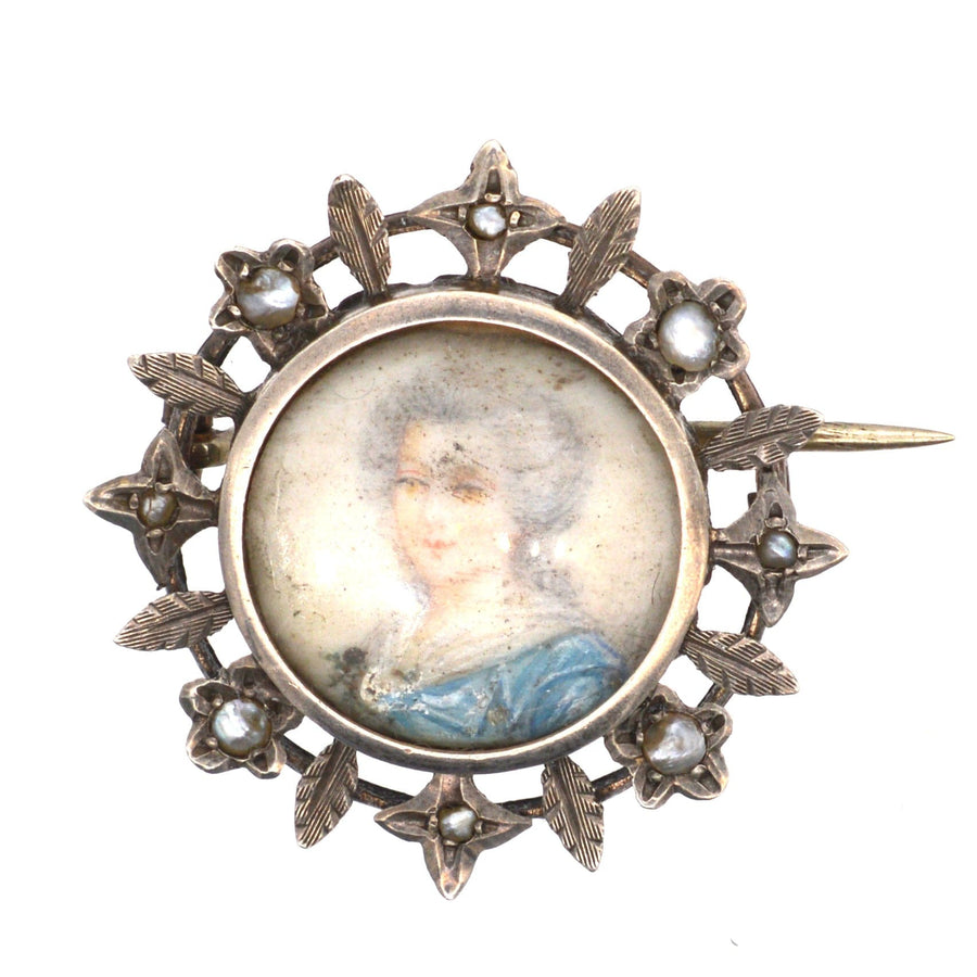 Victorian silver gilt brooch featuring a hand-painted portrait of a Georgian lady on mother of pearl.
