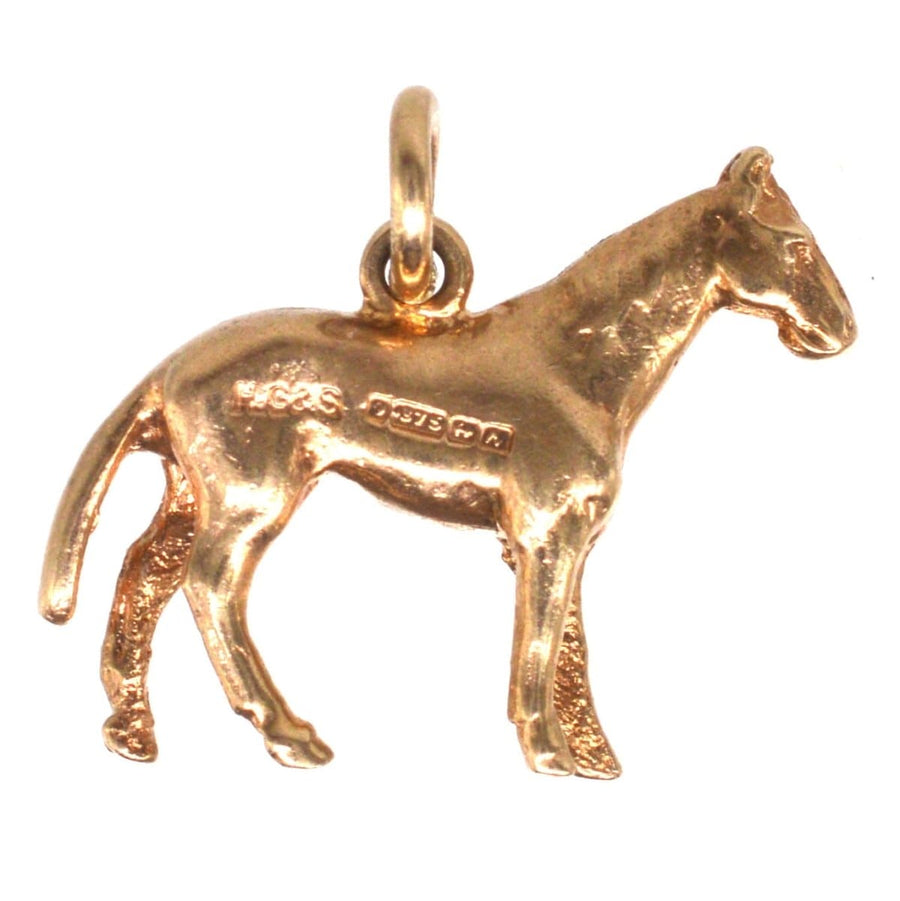 Vintage 9ct gold horse charm pendant, hallmarked, crafted in 1962 by Henry Griffith & Son, perfect for charm bracelets.