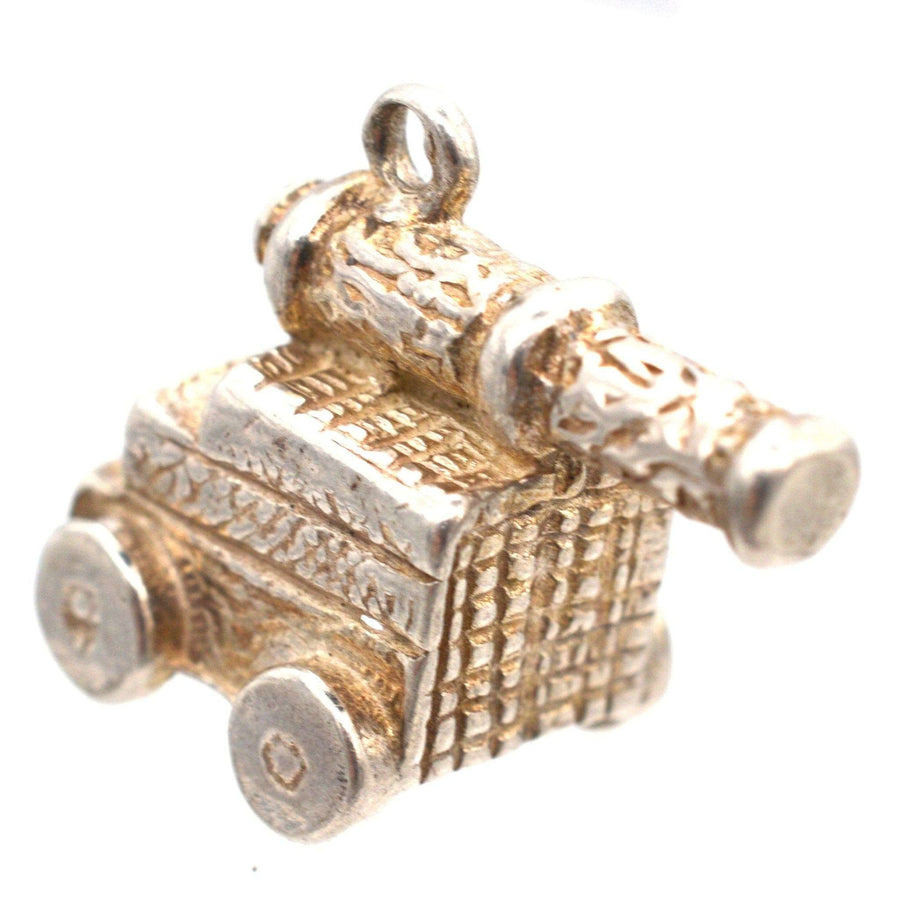 Vintage silver cannon charm pendant from the 1970s, ideal for Arsenal fans or naval battle enthusiasts.