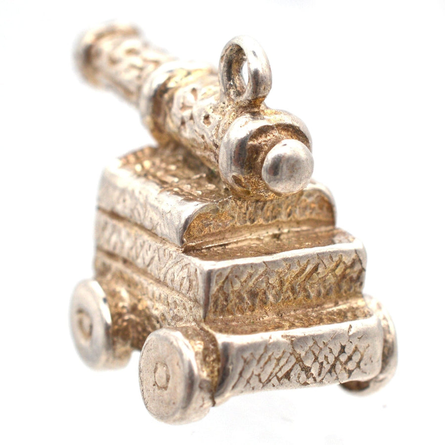 Vintage silver cannon pendant charm, 1970s, perfect for Arsenal fans and pirate/naval enthusiasts.