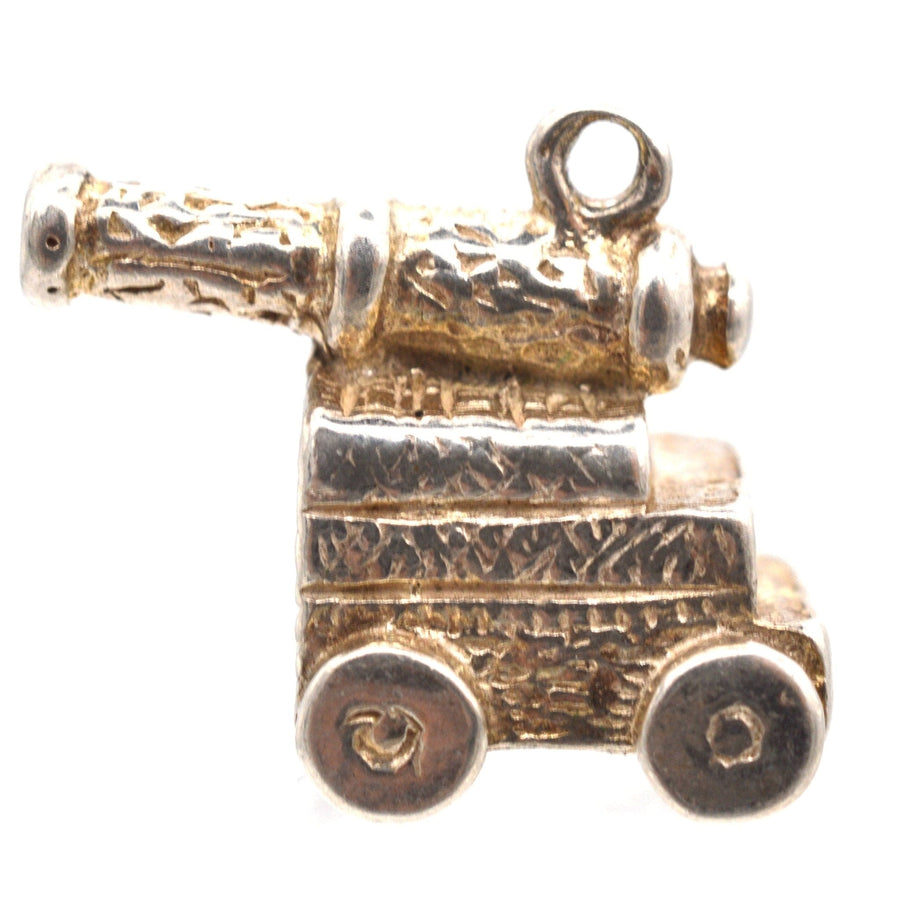 Vintage silver cannon charm pendant from the 1970s, ideal for Arsenal fans and lovers of naval battle tales.