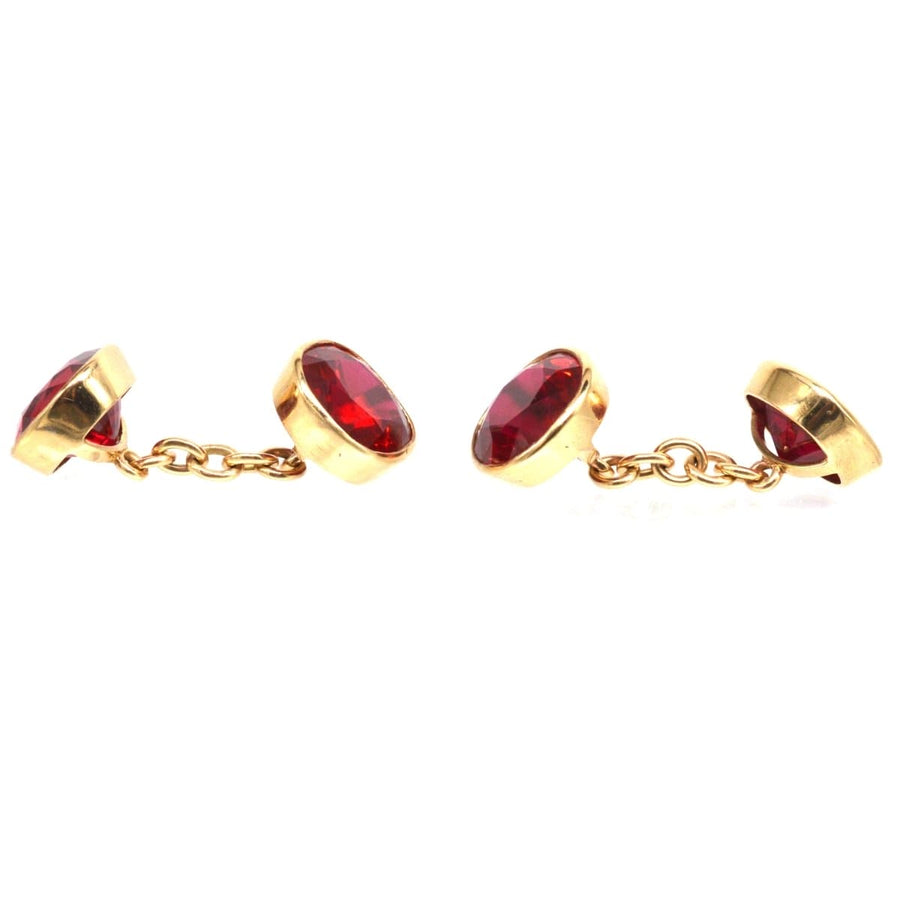 1940s 9ct gold cufflinks with vibrant red paste stones, a stylish accessory for a crisp shirt cuff.