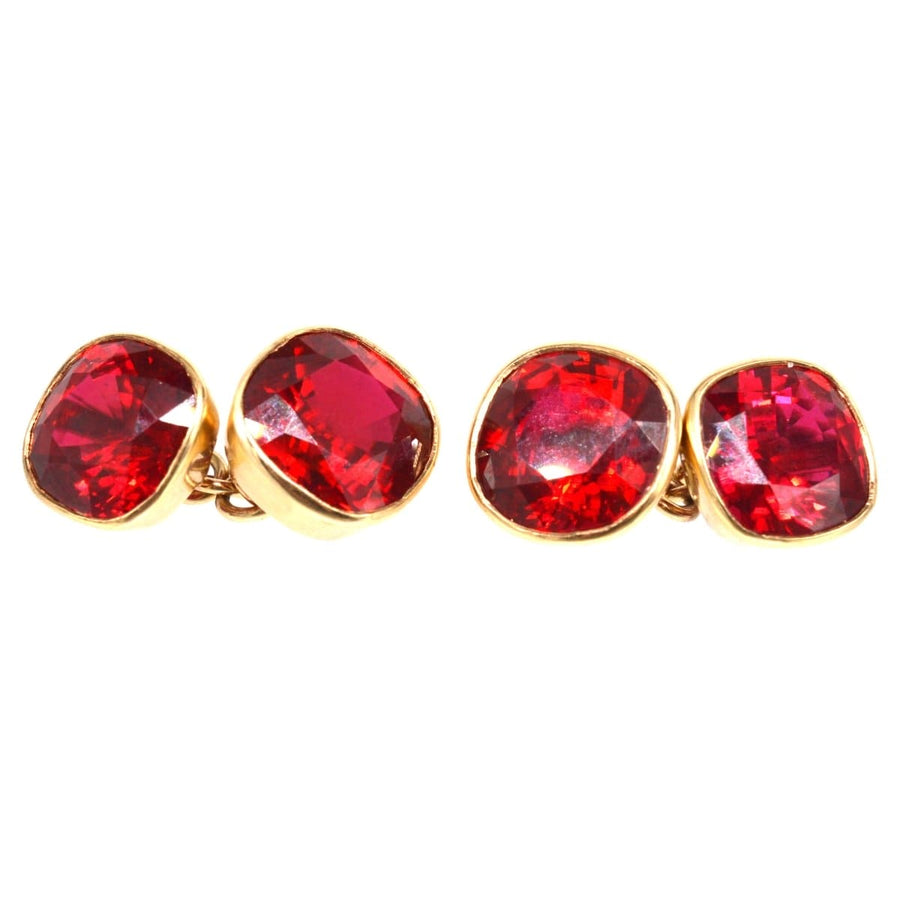 1940s 9ct gold cufflinks featuring vibrant red paste stones, perfect for a stylish shirt cuff.
