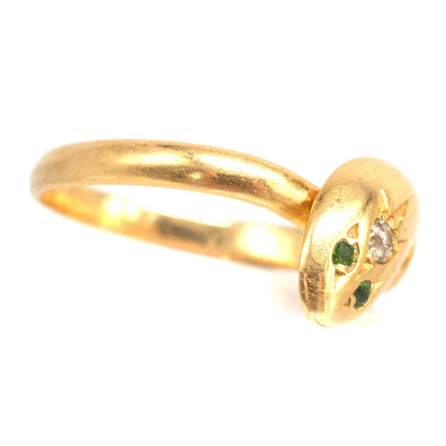 Edwardianischer Schlangenring aus 18 Karat Gold mit Diamanten und grünen Granataugen für einen atemberaubenden Vintage-Schmuck-Look.