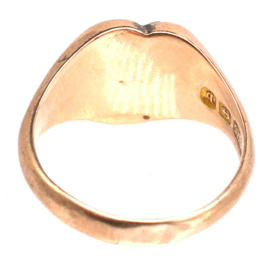 Back view of an Edwardian 9ct gold signet ring with a heart-shaped design, showcasing fine antique craftsmanship.