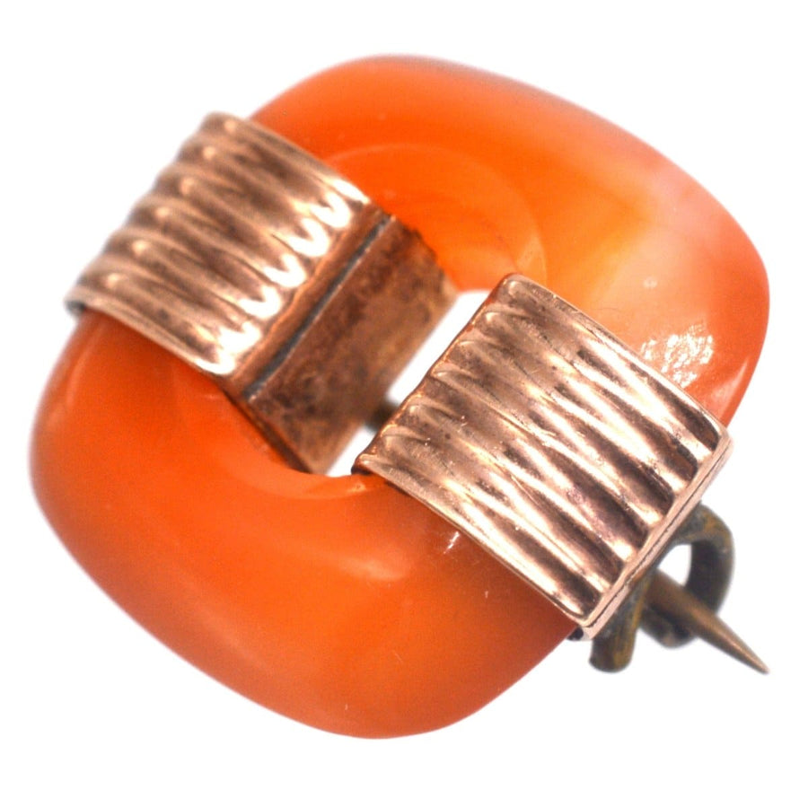 Art Deco 9ct gold brooch featuring a unique carnelian agate design, ideal for men's or women's lapels.