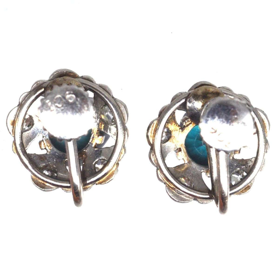Art-Déco-Ohrringe aus 9-karätigem Weißgold mit blauem Zirkon und Diamanten, die sich durch ein kompliziertes Design und leuchtende Steine auszeichnen.
