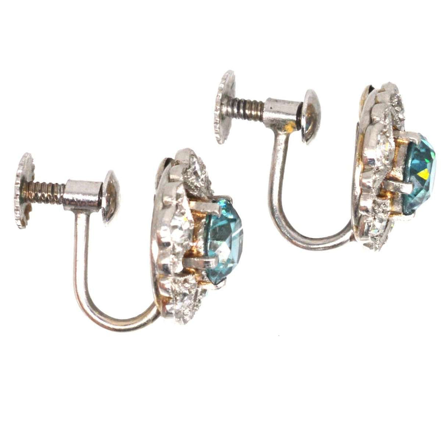 Art-Deco-Ohrringe aus 9-karätigem Weißgold mit blauen Zirkonen und Diamanten in Clustern mit kompliziertem Cut-out-Design.
