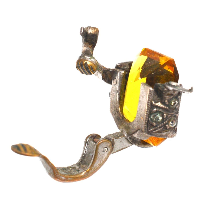 Art-Déco-Ohrringfassung mit einem großen gelben Strassstein, mit komplizierter Metallarbeit und Design.
