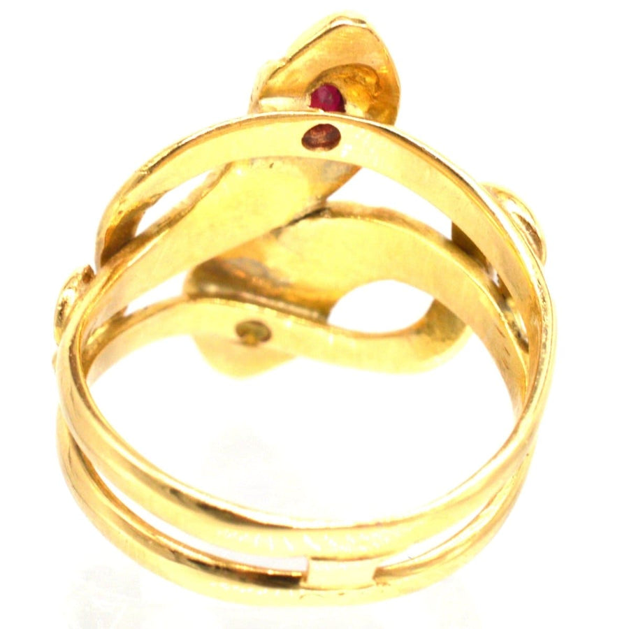 Antiker französischer Doppelschlangenring aus 18 Karat Gold mit einem Rubin und einem Granat, die ewige Liebe und Verpflichtung symbolisieren.