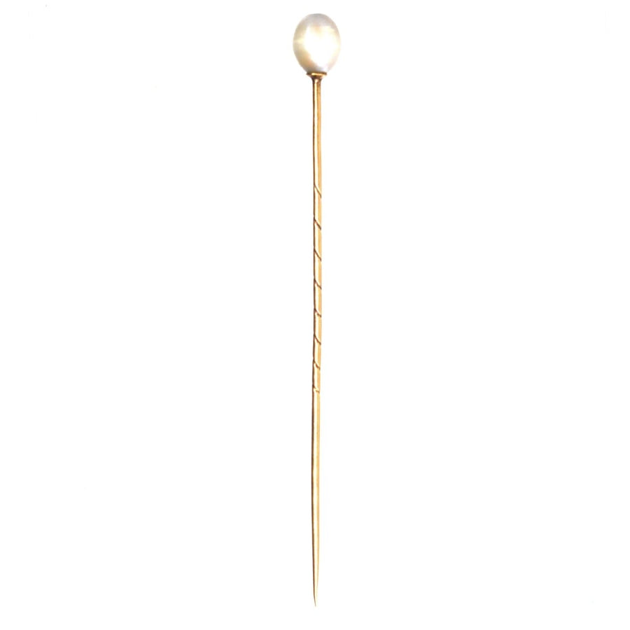Early 20th century Austro-Hungarian gold tie pin with natural pearl, showcasing vintage elegance.