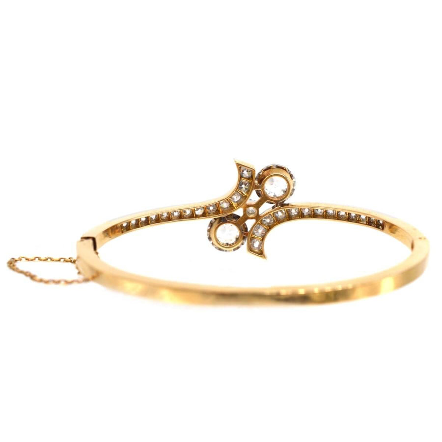 Französischer Diamantarmreif aus 18-karätigem Gold und Platin des 20. Jahrhunderts Toi et Moi mit kompliziertem Design und Diamanten.
