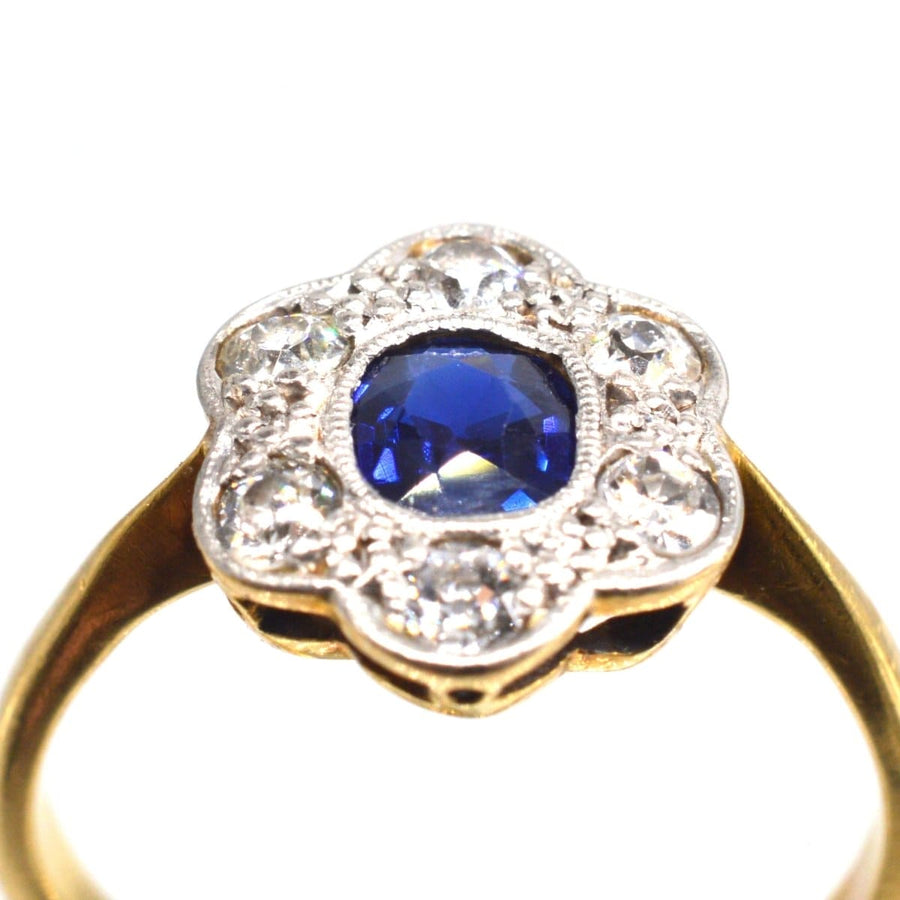 Edwardian 18ct Gold und Platin Saphir-Diamant-Cluster-Ring mit floralem Design und zentralen blauen Saphir