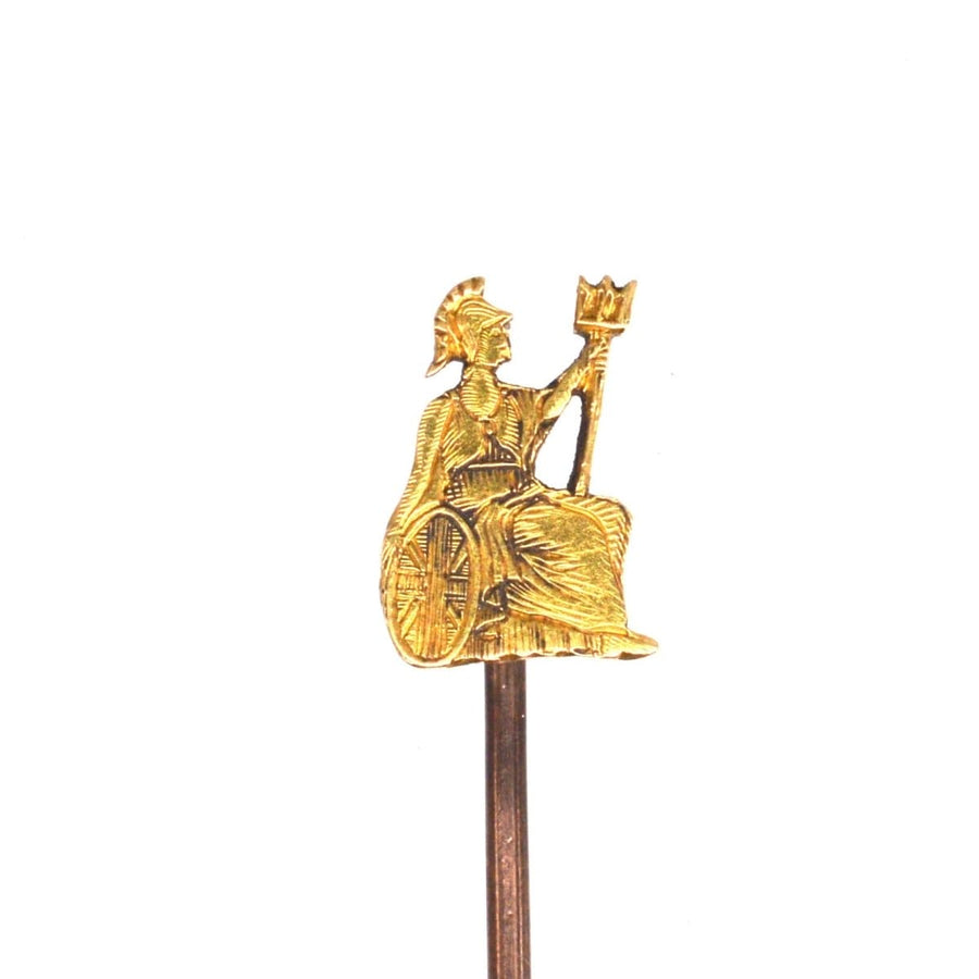 Detail of a vintage 18ct gold Britannia tie pin, symbolizing the Royal Norfolk Regiment.