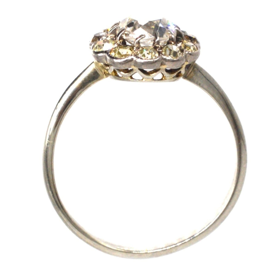 Edwardian 18ct white gold cluster ring featuring old mine cut diamonds and unique tinted diamond accents