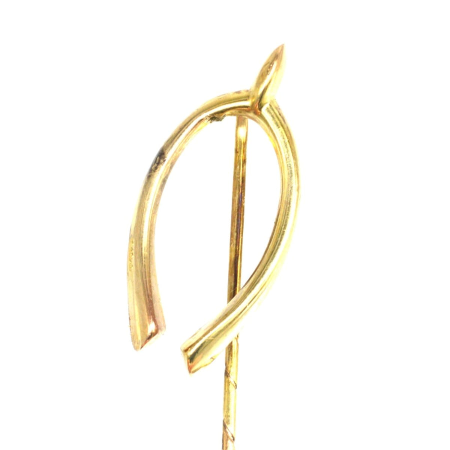 Large 9ct gold wishbone tie pin with hallmarks from 1913, Birmingham and Vienna, Austria.