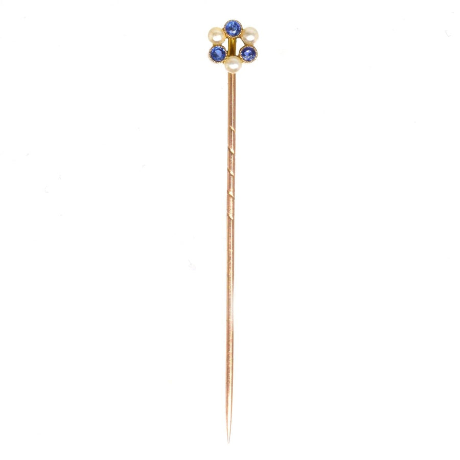 Edwardian 9ct gold tie pin featuring sapphires and pearls, crafted circa 1910s, ideal as a wedding gift.