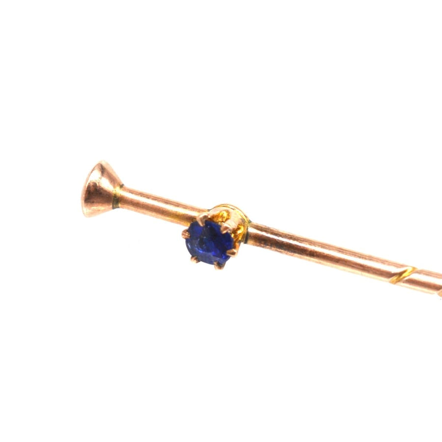 Edwardian 9ct gold tie pin featuring a sapphire, inspired by antique walking canes, perfect wedding accessory.