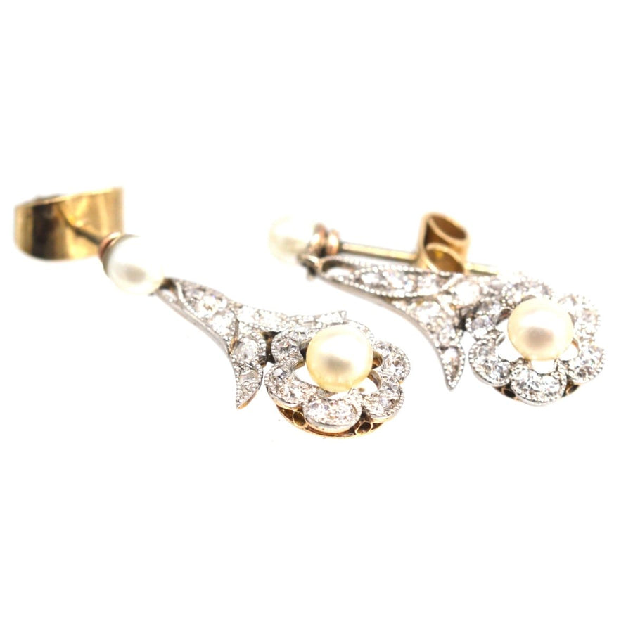 Edwardianische Platin- und Goldperlen-Diamant-Ohrringe mit floralem Design, perfekt für Hochzeiten und besondere Anlässe.