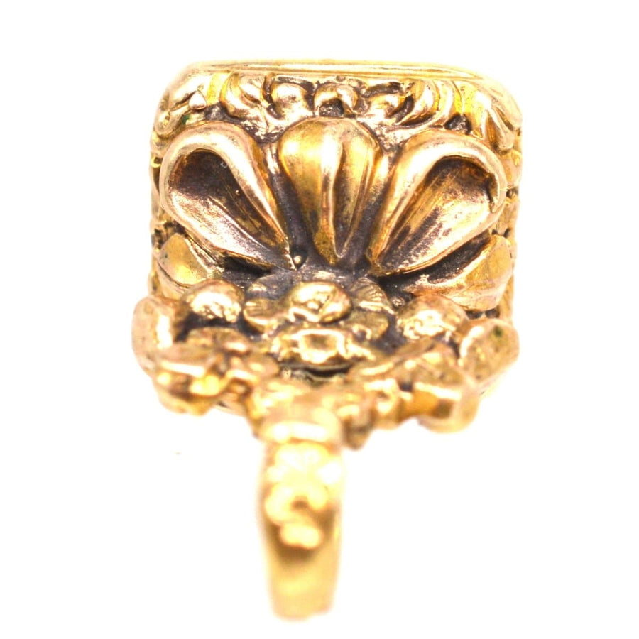 Georgian 15ct gold seal ring featuring intricate floral motifs and detailed craftsmanship from the 1800s.