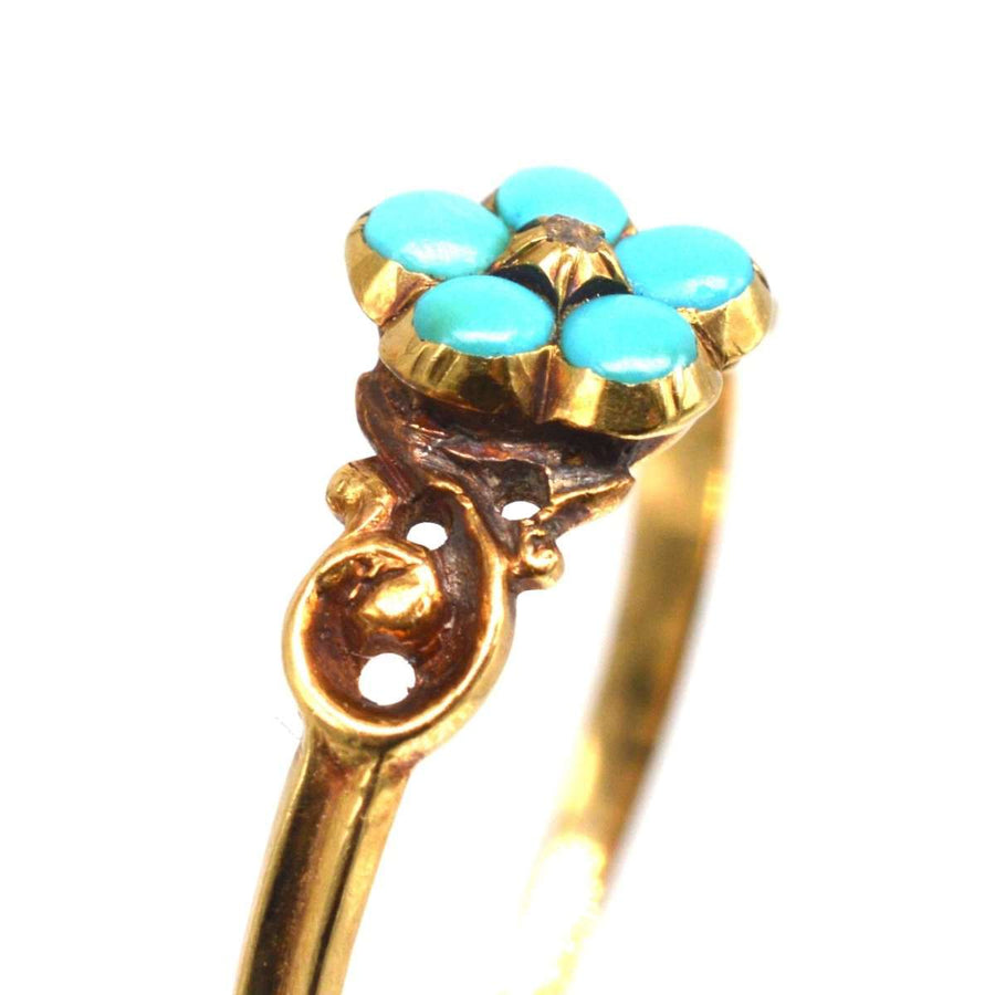 Georgianischer William IV. Ring aus 18-karätigem Gold mit türkisfarbenem Blütenkranz und fünf Blütenblättern, die Erinnerung und Zuneigung symbolisieren.