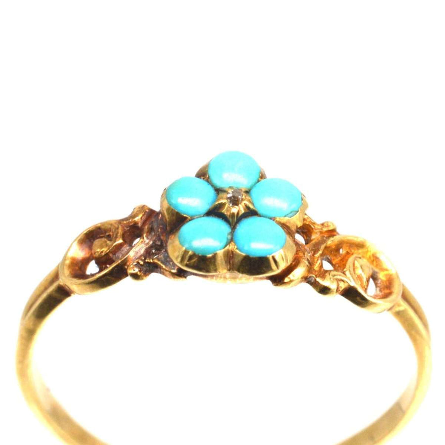 Georgianischer Ring aus 18-karätigem Gold mit einer Vergissmeinnicht-Blume aus Türkis, die Erinnerung und Treue symbolisiert.