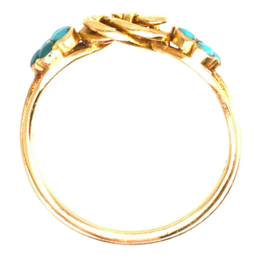 Knotenring aus 18-karätigem Regency-Gold mit Vergissmeinnicht-Blüten aus Türkis, die Liebe und Erinnerung symbolisieren.
